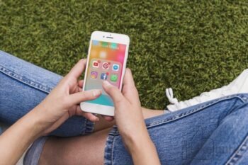 woman-holding-mobile-using-social-network-applications_23-2147844480