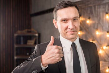 male-suit-showing-thumb-up_23-2148112210
