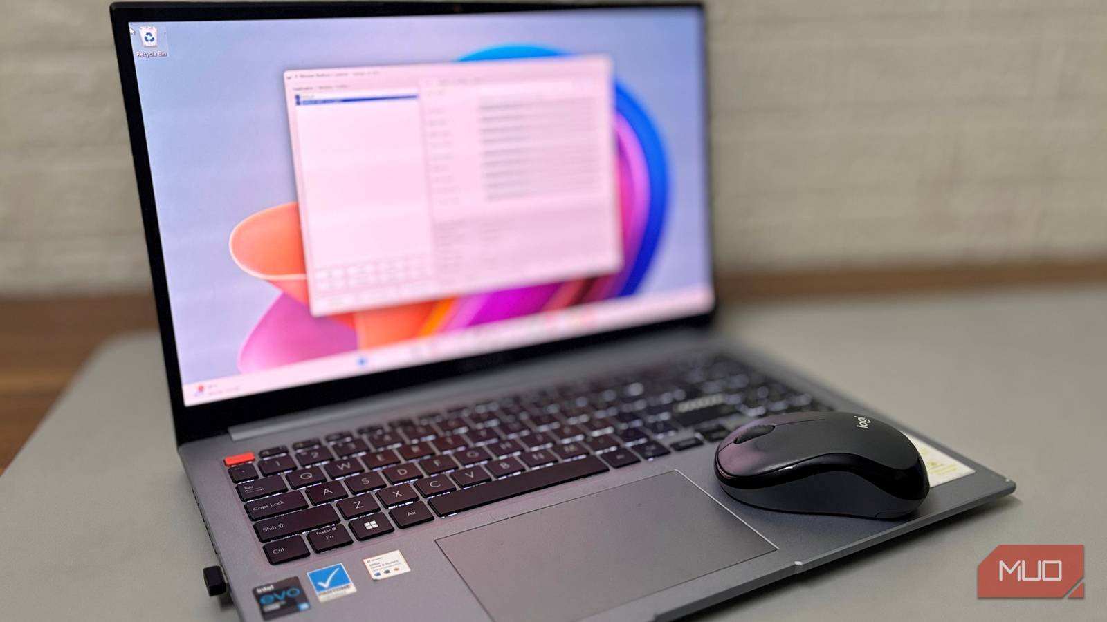 1761073317_open-laptop-with-a-blurred-screen-running-x-mouse-button-control-and-a-logitech-wireless-mouse-placejpeg | ILikeGuru 1761073317_open-laptop-with-a-blurred-screen-running-x-mouse-button-control-and-a-logitech-wireless-mouse-placejpeg